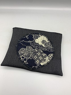 Pochette en polyester et coton japonais / 18 €