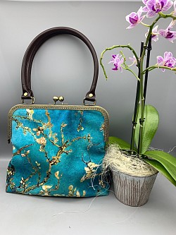 Sac en velours lisse avec fermoir et poignées